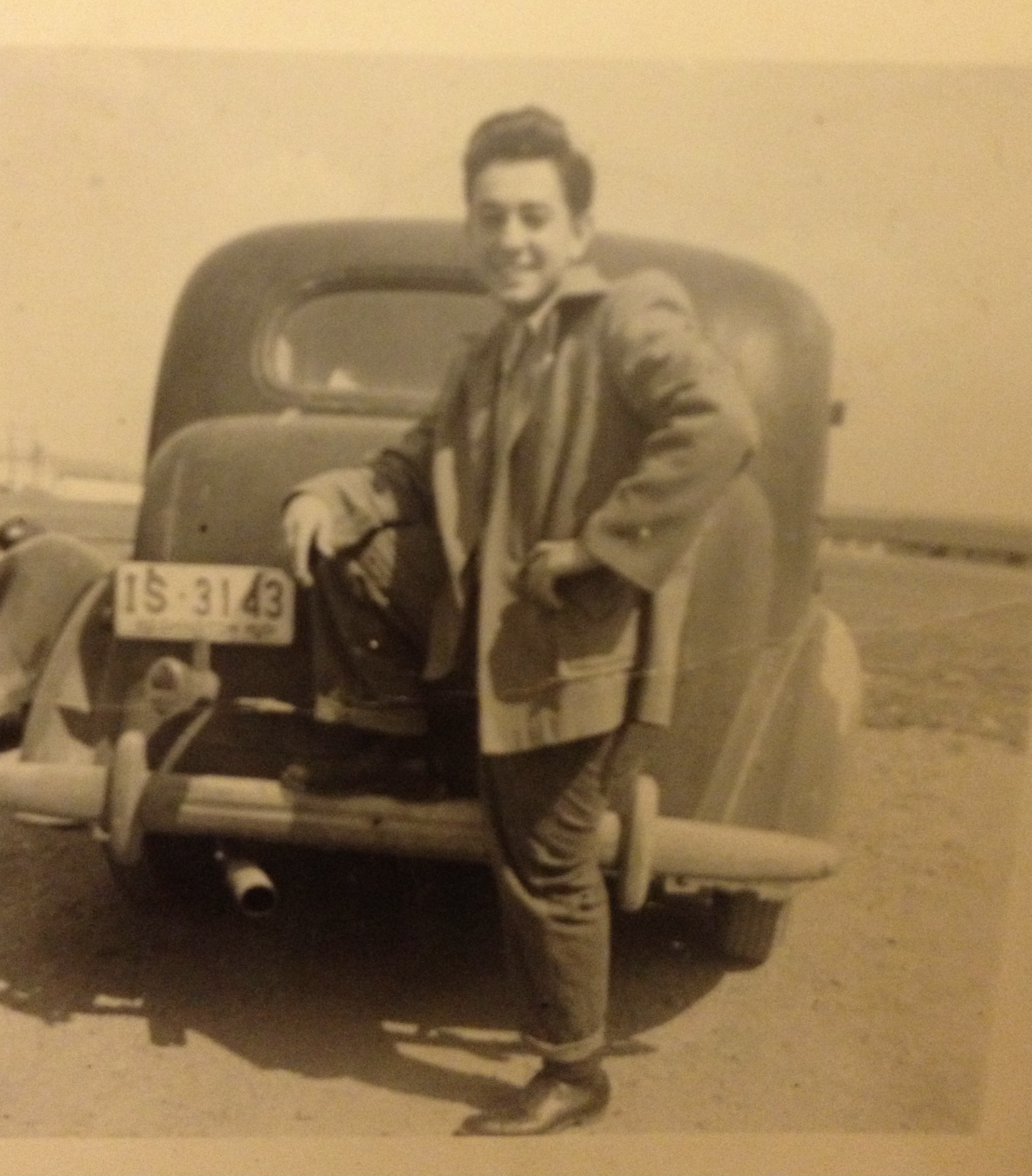 11 George Moe Garabedian and automobile at the beach.jpg