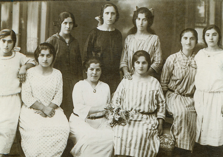 1 Siranoush Manassian in orphanage  clothing, back row right.jpg